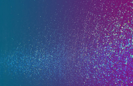 闪闪发光的紫耳蓝色闪闪发光的星星点在渐变的蓝色紫罗兰色背景和蓝色