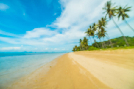 抽象模糊和弥散热带海滩和海与椰子棕榈树背景为旅行和假期