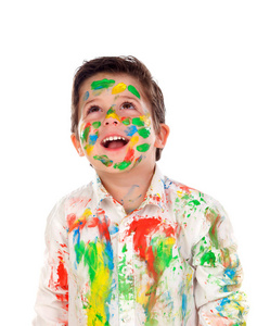 滑稽的小男孩与面孔和衣裳被画覆盖, 被隔绝在白色背景