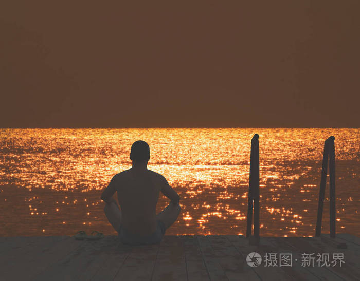 坐在海边的男人