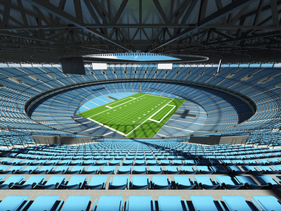 巨大的空足球竞技场美丽的现代美式足球体育场与 10 万球迷的天空蓝色