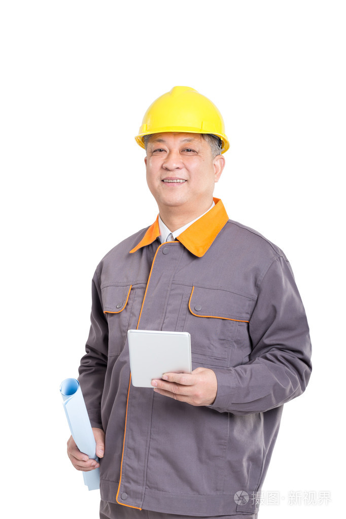 工程师与蓝图的安全帽和平板照片-正版商用图片0oyei4-摄图新视界