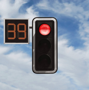 交通灯与计时器-红色的天空照片