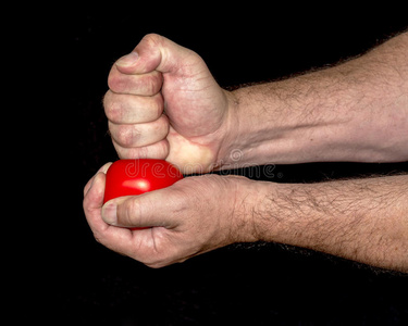 用手在压力球上用力照片