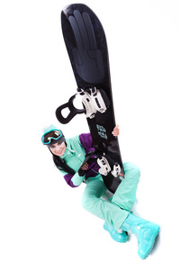 紫色的滑雪服装与滑雪板的女人