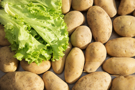 土豆生蔬菜食品市场的花纹纹理和背景