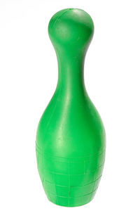 一个塑料玩具绿色别针 skittle 被隔绝在白色背景上