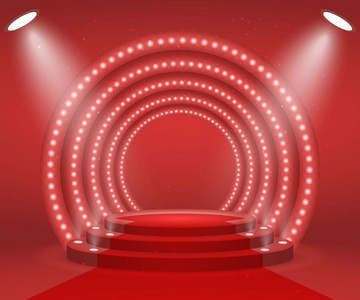 舞台灯为颁奖典礼。照亮了红色地毯的圆形讲台。基座
