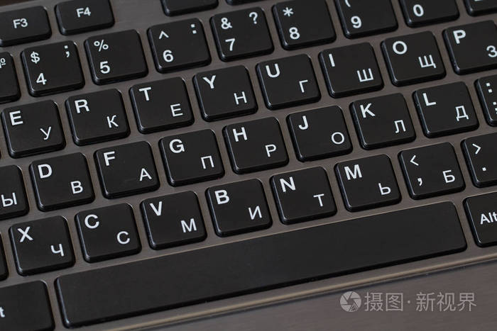 黑色键盘的笔记本电脑特写业务或教育的概念