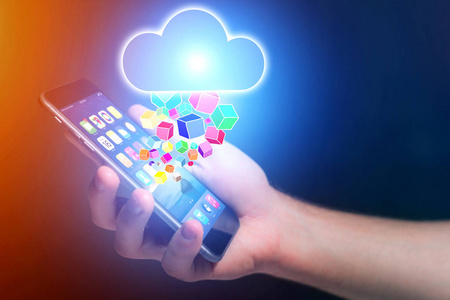 云存储图标飞出智能手机技术的概念