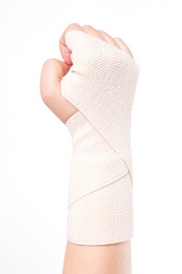 摄影棚用弹力绷带绑住女性手腕照片