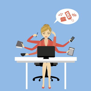 业务的女人或办公室工作者坐在电脑前照片