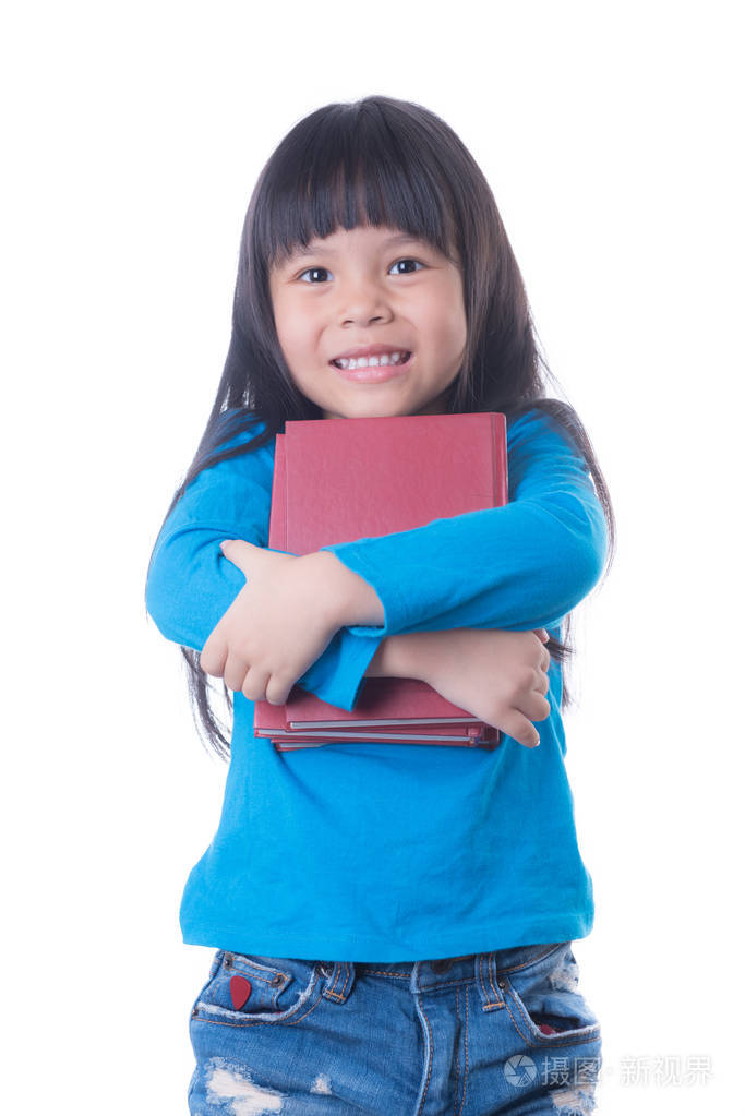 小女孩阅读一本书在一个以上的白色背景隔离