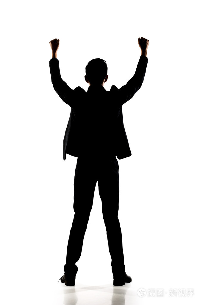 亚洲商人张开双臂的剪影