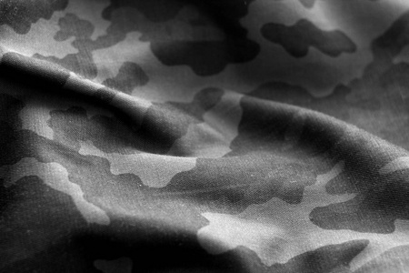 黑白相间的军服图案, 效果模糊。抽象背景和纹理