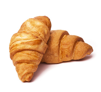 孤立在白色背景上的两个羊角面包照片
