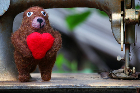 毛熊心缝机图片