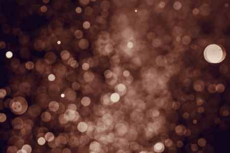 圣诞散景背景纹理抽象亮闪闪发光的明星在散景。闪光复古灯背景