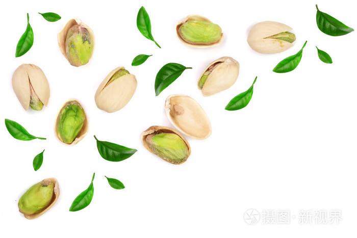 开心果与叶子隔绝在白色背景与拷贝空间为您的文本, 顶面视图.