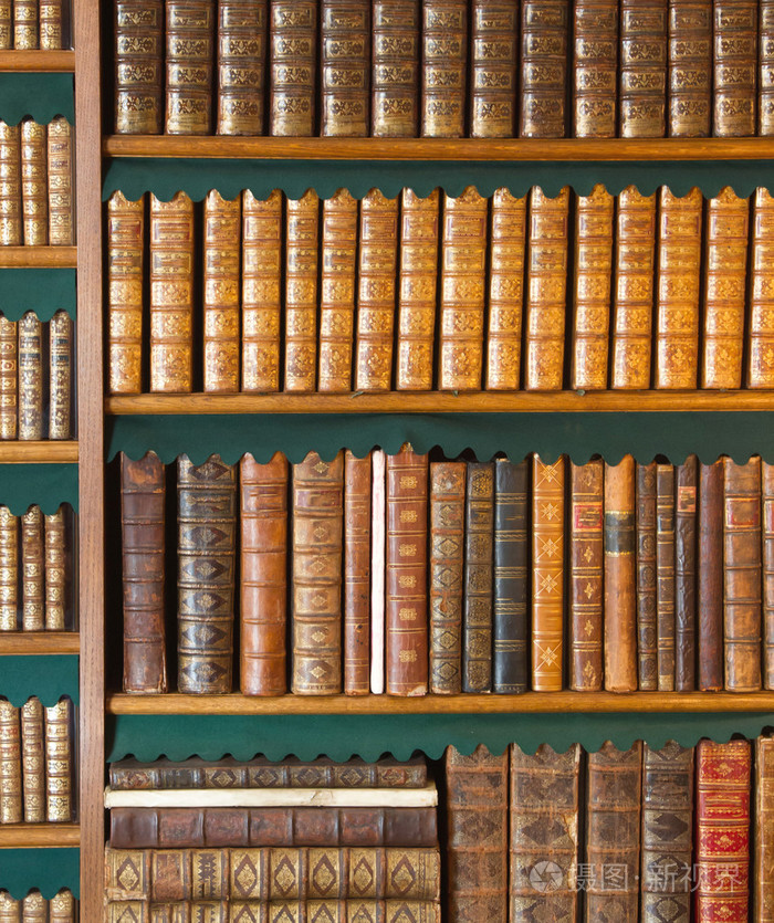 书架.老式的藏书,古董书纹理覆盖