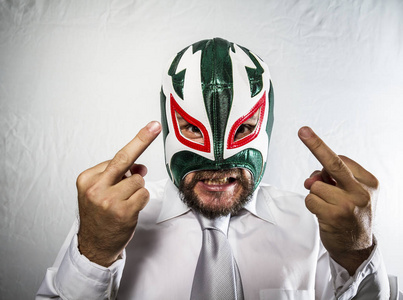 愤怒的商人戴着面具的墨西哥战斗机照片