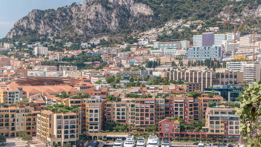 Fontvieille timelapse摩纳哥新区全景。船, 游艇在海港和一个高层公寓建筑群。摩纳哥公国是一个主权城市州, 