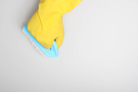 黄色手套刷蓝色清洁清洁