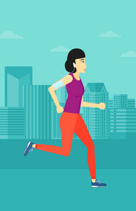 女人用耳机和智能手机慢跑。
