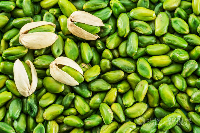 很多绿色的开心果坚果食品背景