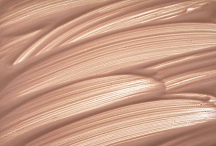 浅米色奶油粉底纹理背景照片