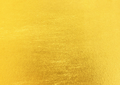 闪闪发亮的黄色叶金箔纹理背景照片