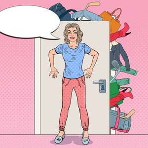 年轻女子捧着大堆的衣服与门.波普艺术矢量图照片