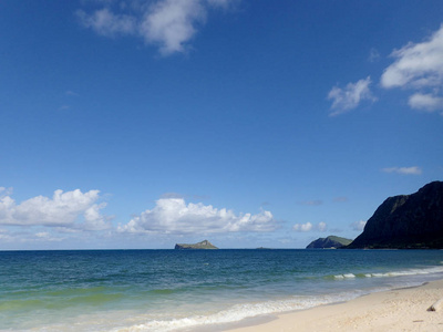 马纳洛海滩上的柔和波浪圈, 在夏威夷的瓦胡岛上寻找兔子岛和岩石岛。2014年10月