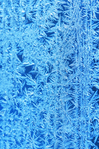 冬季冰霜冻结背景。 磨砂窗玻璃纹理