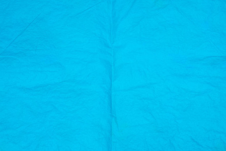 蓝色折痕纸巾背景纹理