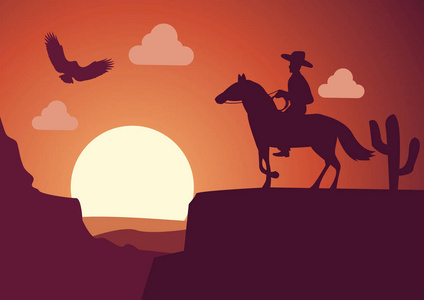 剪影风景牛仔在沙漠在日落时间