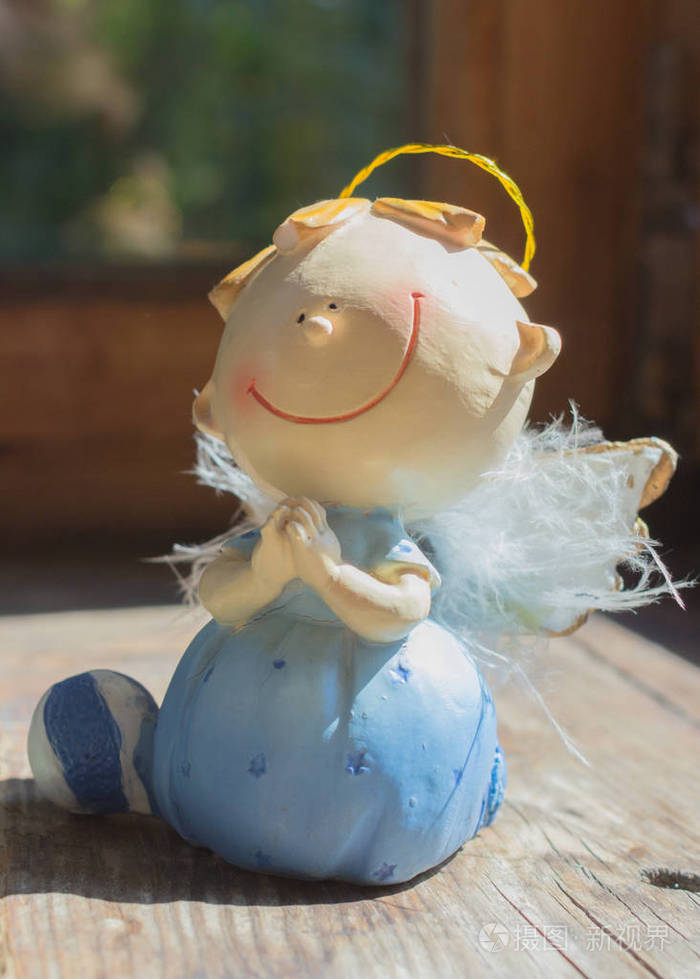 天使在阳光的照射下.孩子的真诚祈祷.爱, 理解和宽恕.为和平祈祷.