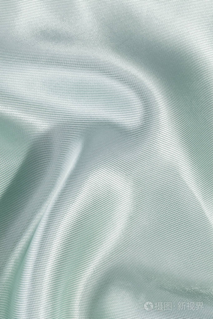 丝绸的背景下，绿色纹理肋闪光布