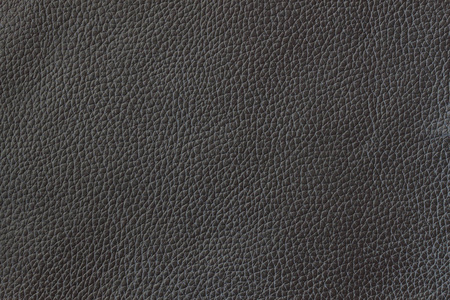 牛皮真皮特写的纹理.黑颜色.自然,工匠背景使用基体组成,复古设计.