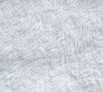 棉毛巾白色天然棉毛巾花纹纹理背景照片