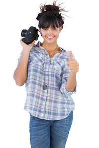 女人举着相机竖起大拇指图片