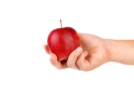 手上有成熟的红苹果。