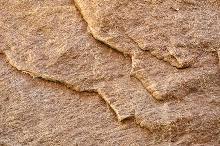 棕色的岩石石背景照片