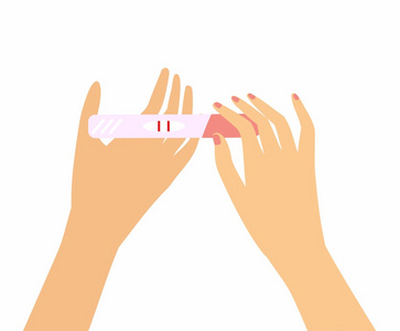 女人她手里拿着一个怀孕测试照片