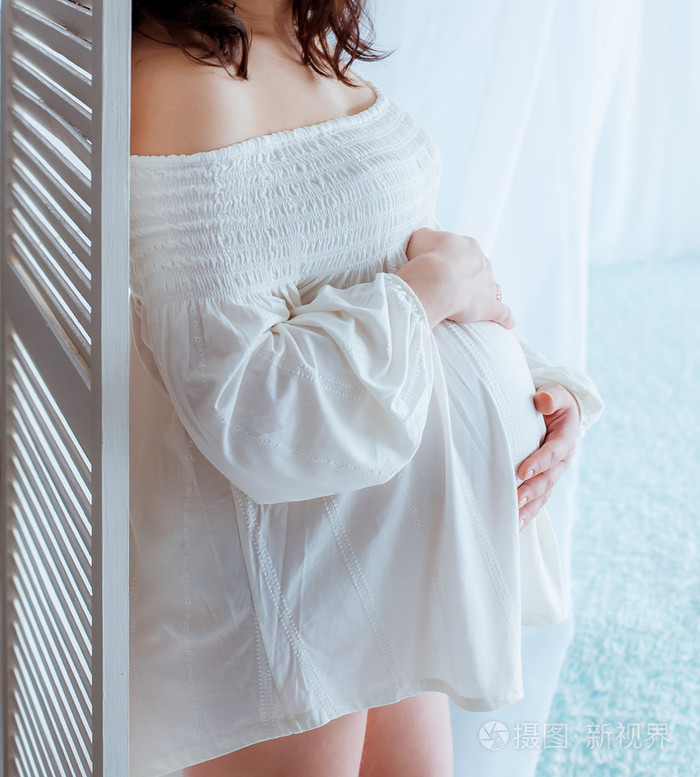 孕妇的肚子的女人照片-正版商用图片0qqm0j-摄图新视界