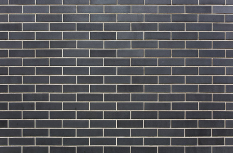 带白色接缝墙的现代石材黑砖 horisontal 图案纹理背景照片