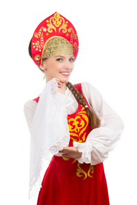 小女孩美丽的白种人微笑着身着俄罗斯民族服装
