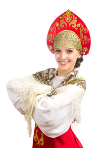小女孩美丽的白种人微笑着身着俄罗斯民族服装