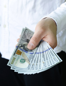 商人手里拿着美元现金-商务, 财政, 人金钱观照片