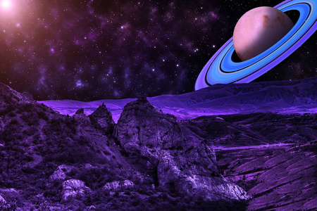 外星人的风景.岩石的背景上的星空照亮了太阳和行星与环.不是3d照片